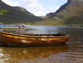 The picture postcard setting of the jetty at Loch Maree